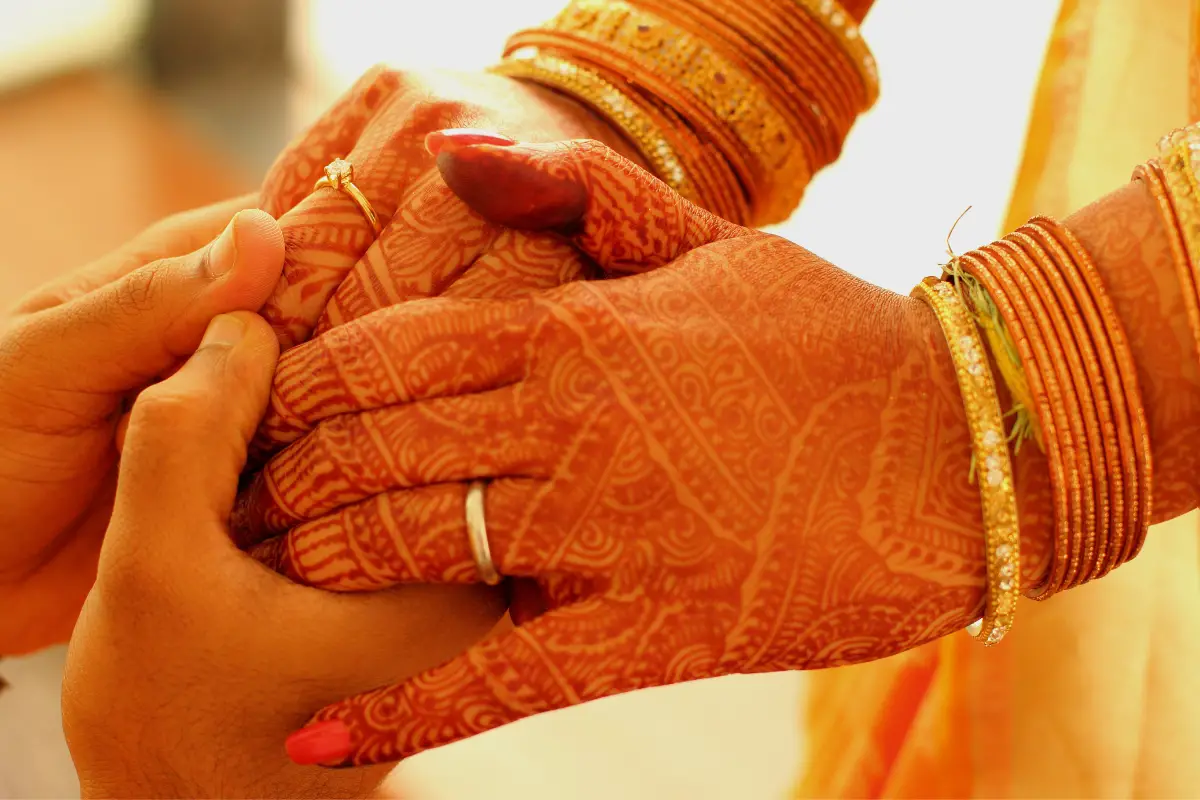 couple join hand sin arranged marriages