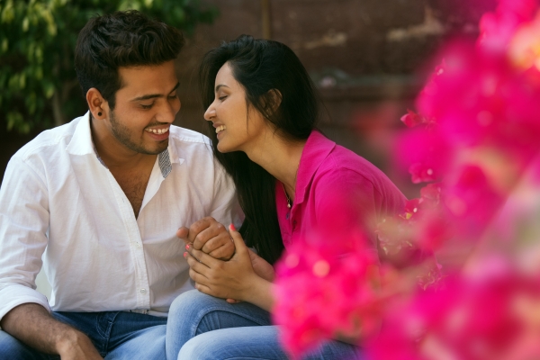 young indian arranged married couple lauging and love