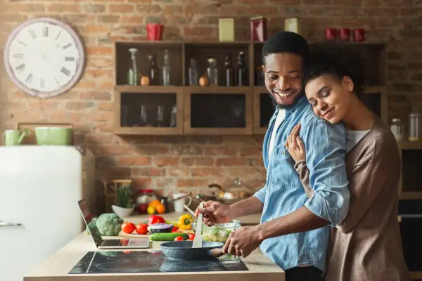 happy couple in kitchen 